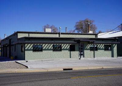 Front of green building exterior.