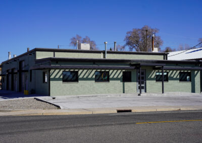 Front of green building exterior.