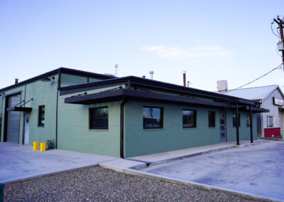 Front of green building exterior.