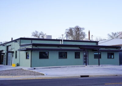 Front of green building exterior.