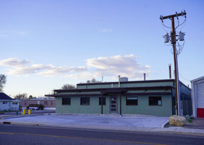 Front of green building exterior.